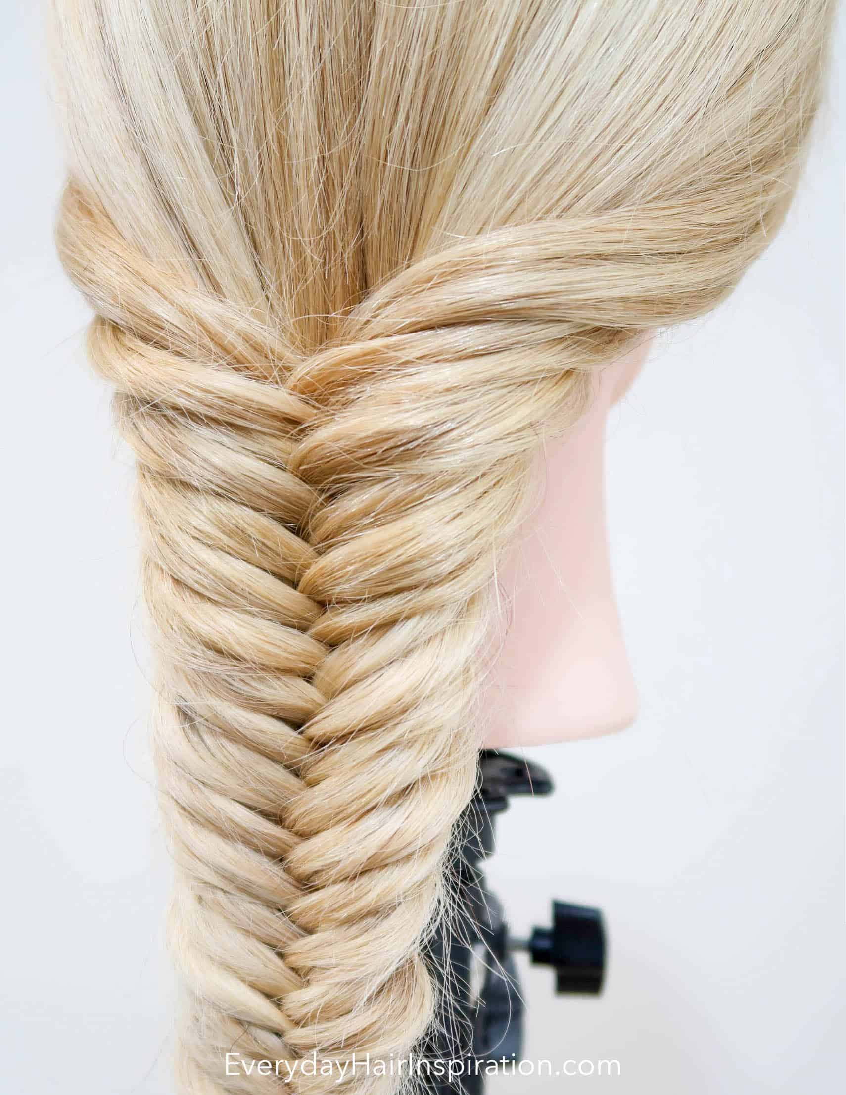 Woman fishtail plait hi-res stock photography and images - Alamy